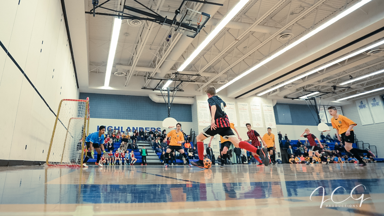 WCFC futsal players competing on court